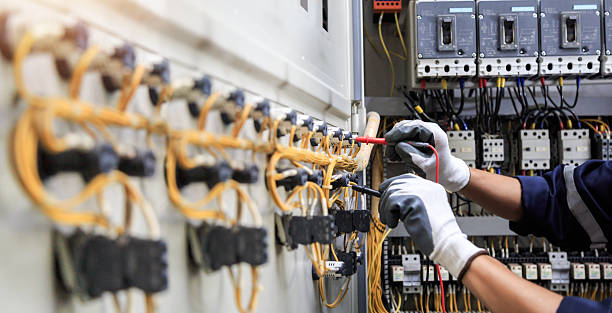 Professional Electrical Panel Upgrade technician working in Summit County County, OH
